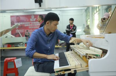 珠江钢琴集团是培养乐器制造人才的“摇篮”