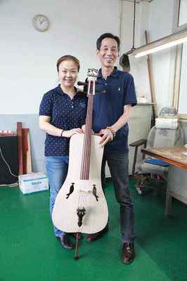 民族乐器上海制造:六角形、瓷瓶形民族低音拉弦乐器问世